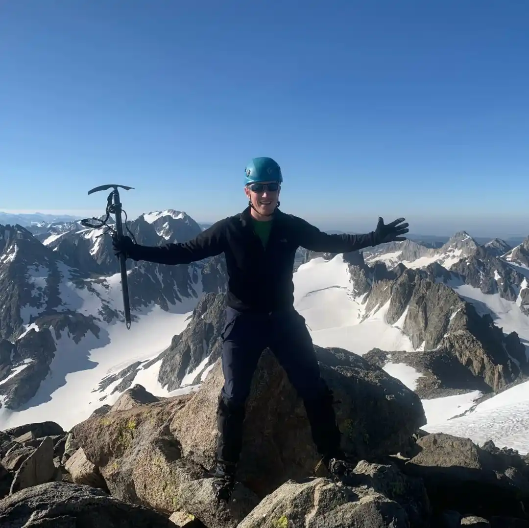 Team member on a Colorado mountain summit