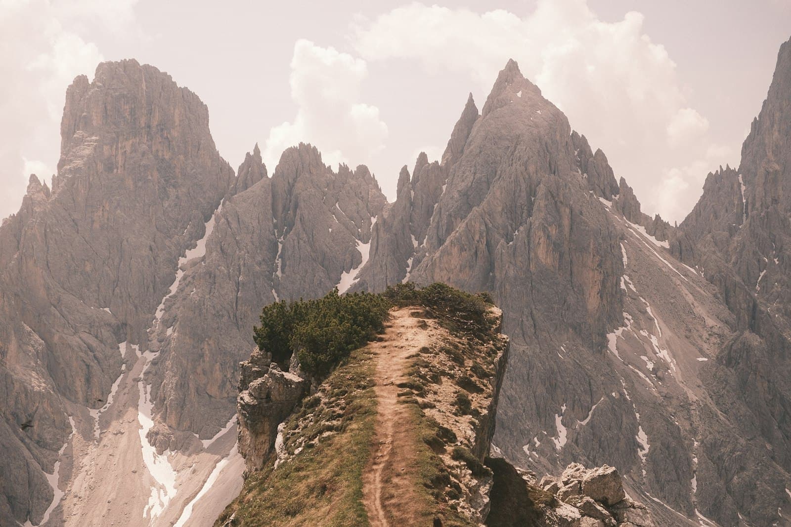 Path leading upward through a landscape